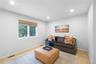 Living room featuring recessed lighting and carpet flooring