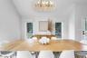 Dining space featuring healthy amount of natural light and lofted ceiling