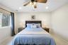 Bedroom featuring light colored carpet, recessed lighting, and ceiling fan