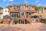 Brick exterior with a tile roof