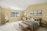 Virtually staged primary bedroom