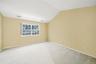 Primary bedroom with walk in closet and en-suite bathroom