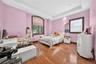 Hardwood-finish flooring throughout, recessed ceiling lighting, and crown molding