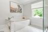 Separate soaking tub