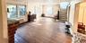 Large 24 X 20 Living room with hard wood floors and wood burning fireplace