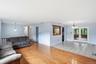 Living room flows to formal dining room