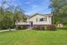 A great home with a level yard and shed