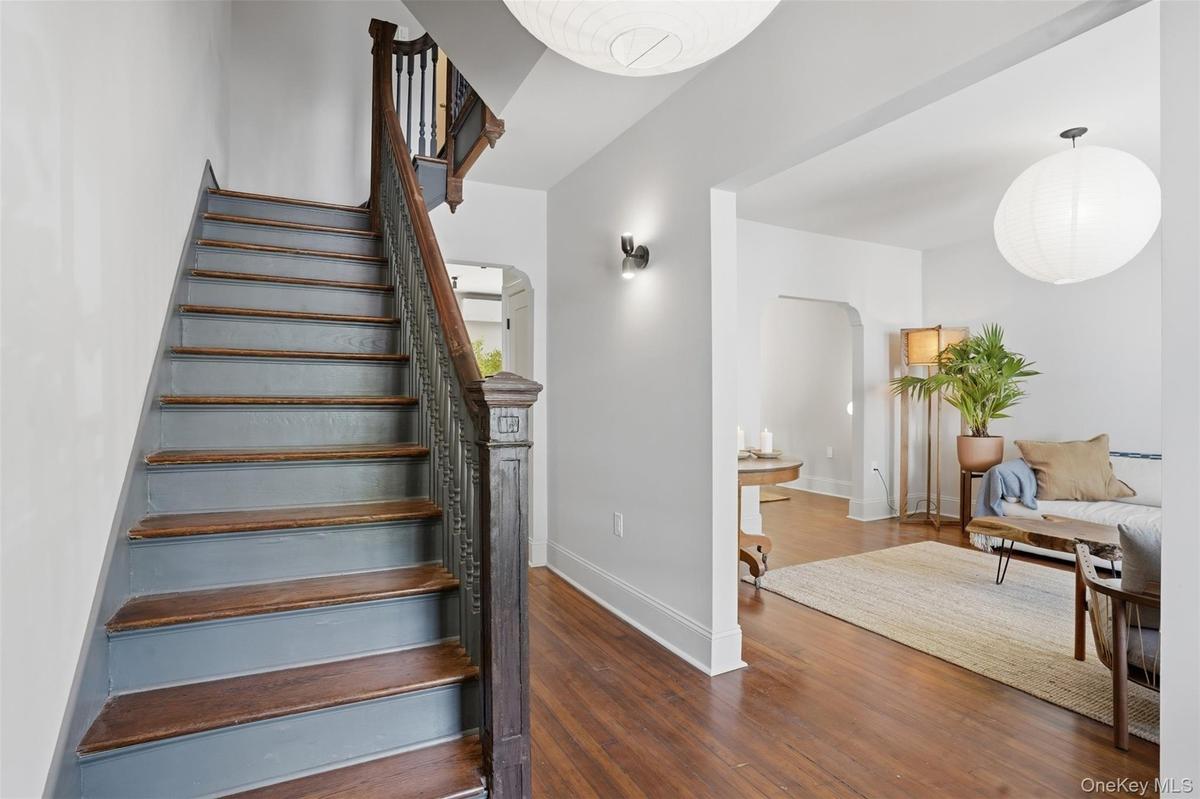 Hardwood flooring throughout the entry and main living area
