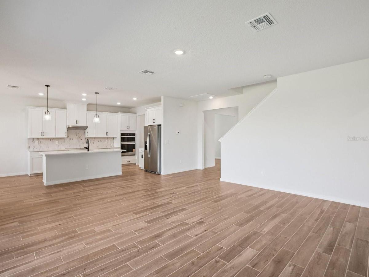 Photo is not of the actual home, but is an inspirational photo of builder’s model home and may depict options, furnishings, and/or decorator features 