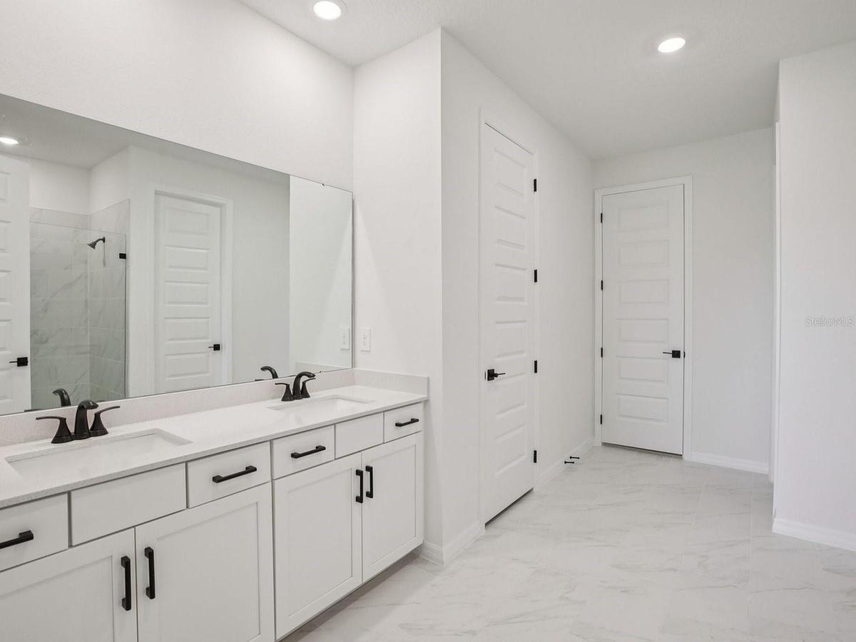 Photo is not of the actual home, but is an inspirational photo of builder’s model home and may depict options, furnishings, and/or decorator features 