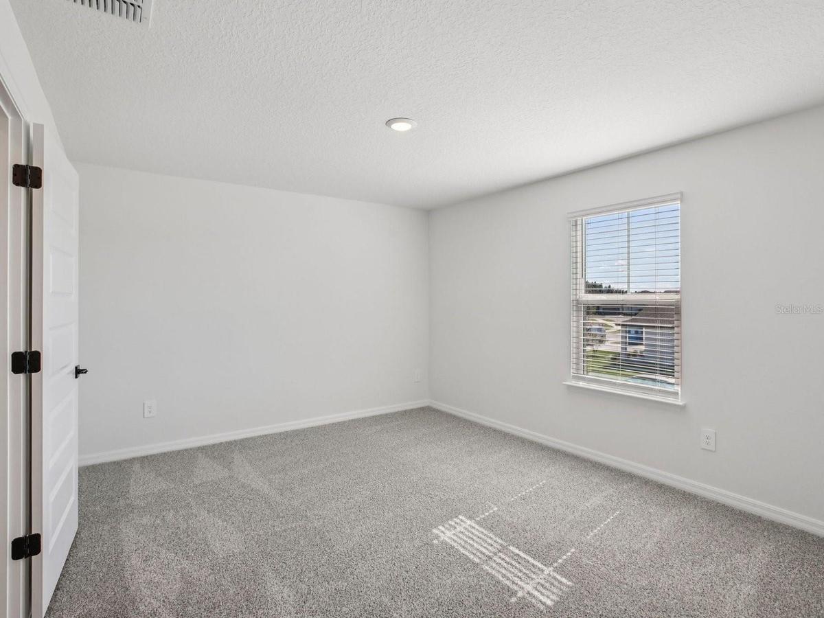 Photo is not of the actual home, but is an inspirational photo of builder’s model home and may depict options, furnishings, and/or decorator features 