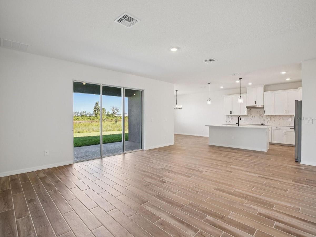 Photo is not of the actual home, but is an inspirational photo of builder’s model home and may depict options, furnishings, and/or decorator features 