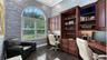 Private Executive office with built-ins off living area.