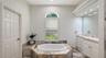 Primary Bathroom separate Tub.