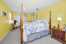 Primary bedroom with attached bathroom