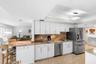 WHITE CABINETS WITH GRANITE COUNTERS