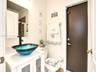 FIRST FLOOR FULL BATHROOM WITH SIDE ENTRANCE DOOR FOR POOL SERVICE
