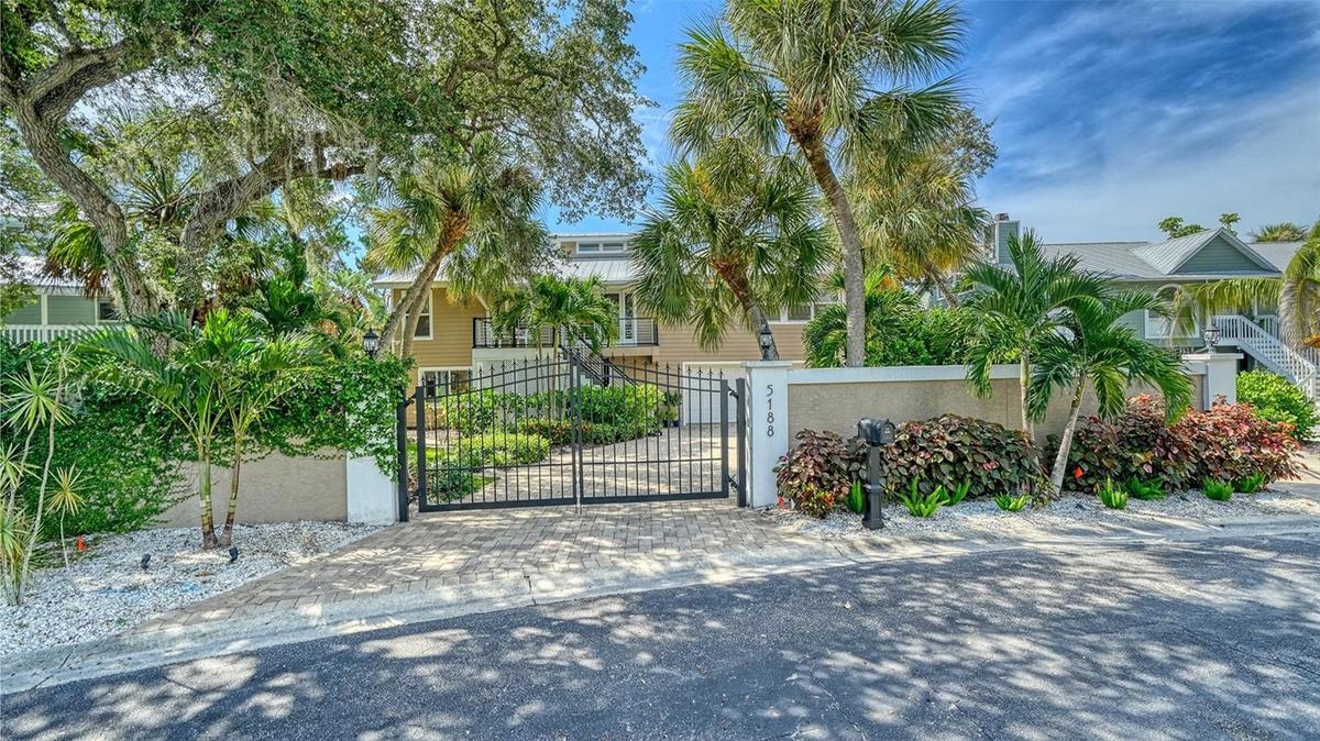 Gated entrance and privacy wall create a wonderful sense of seclusion.