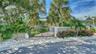 Gated entrance and privacy wall create a wonderful sense of seclusion.