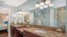 Dual vanity provides plenty of counter and storage space.