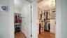 Thoughtfully redesigned walk-in closet with custom organization.