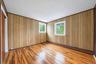 bedroom with hard wood floors