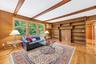 large window and bookcases