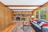 wood burning fireplace and hardwood floors
