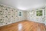 Bedroom with hard wood floors