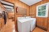 side door entrance and garage entrance into laundry room
