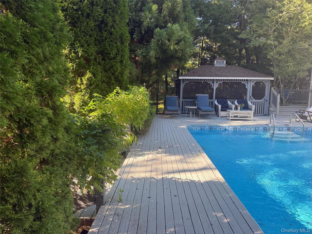 Heated pool with deck surround