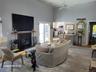 Living Room with Wood burning fireplace and access to Eat in Kitchen