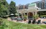 Common patio with bar area and bbqs