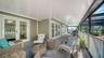 Additional view of the primary suite and its direct access to outdoor living space.