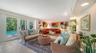 Large family room with direct access to the screened pool and lanai.