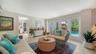 Spacious family room with French doors leading directly outside.