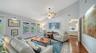 Bright and inviting main living area with vaulted ceilings and abundant natural light.