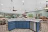 kitchen bar that overlooks living area