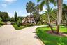 Beautiful resurfaced driveway, plenty of parking for at least 8 vehicles on main house side, plus parking for several more cars on guest house side