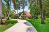 Beautiful resurfaced driveway, plenty of parking for at least 8 vehicles on main house side, plus parking for several more cars on guest house side