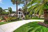 Beautiful resurfaced driveway, plenty of parking for at least 8 vehicles on main house side, plus parking for several more cars on guest house side