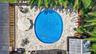 Travertine Deck surrounding beautiful large pool