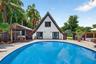 Travertine Deck surrounding beautiful large pool