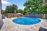 Travertine Deck surrounding beautiful large pool