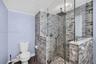 Primary Bathroom, glass shower door and tiled, dual vanity, lovely update