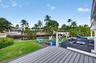 Beautiful Deck surrounds pool area - upper deck leading from the Florida Room on Main Level