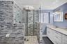 Primary Bathroom, glass shower door and tiled, dual vanity, lovely update