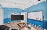 Guest bedroom w/ beamed ceiling w/ large private balcony overlooks pool area