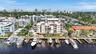 East / West Exposures on this rare building w/ OVERSIZED BOAT DOCKAGE
