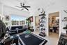 Guest Bedroom in unit 303. Bright / Modern w/ all Marble Flooring, views to Downtown, Impact Windows & Doors. En suite bathroom, and the space on the 